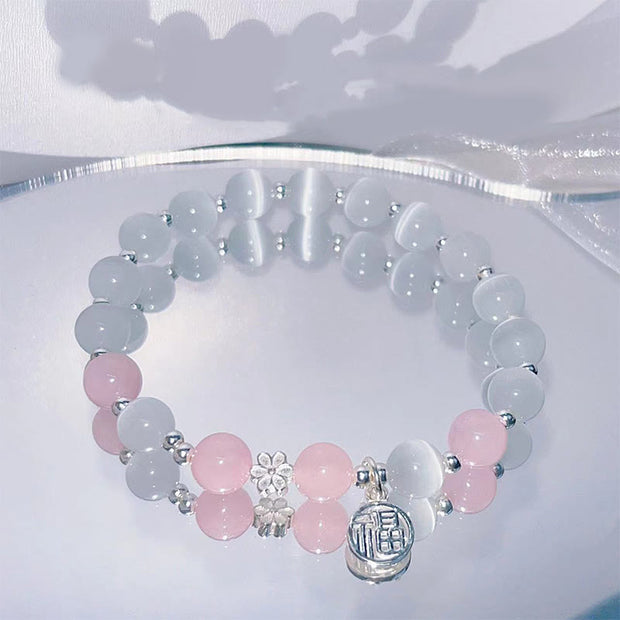 Buddha Stones Cat's Eye Crystal Peach Blossom Bell Fu Character Charm Support Bracelet 4