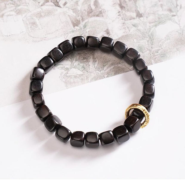 FREE Today: Serenity And Stability Tibetan Ebony Wood Dzi Bead Bracelet FREE FREE Ebony Wood(Wrist Circumference 14-16cm)