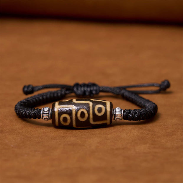 FREE Today: Increase Wisdom And Wealth Tibetan Nine-Eye Dzi Bead Three-eyed Dzi Bead Rope Bracelet FREE FREE Nine-eye Dzi Bead(Wrist Circumference 14-16cm)