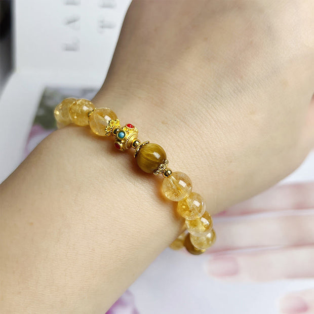 Buddha Stones Citrine Tiger Eye Flower Tassel Generosity Bracelet