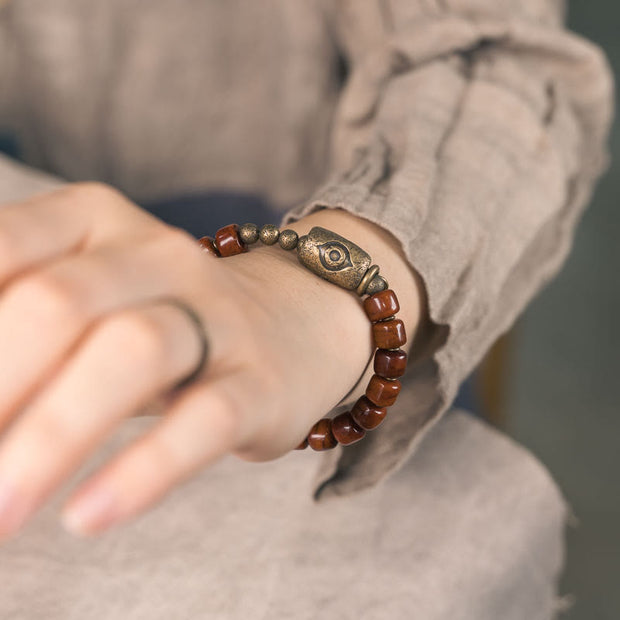 Buddha Stones Bone Beads Dzi Shape Copper Cone Pendant Strength Bracelet