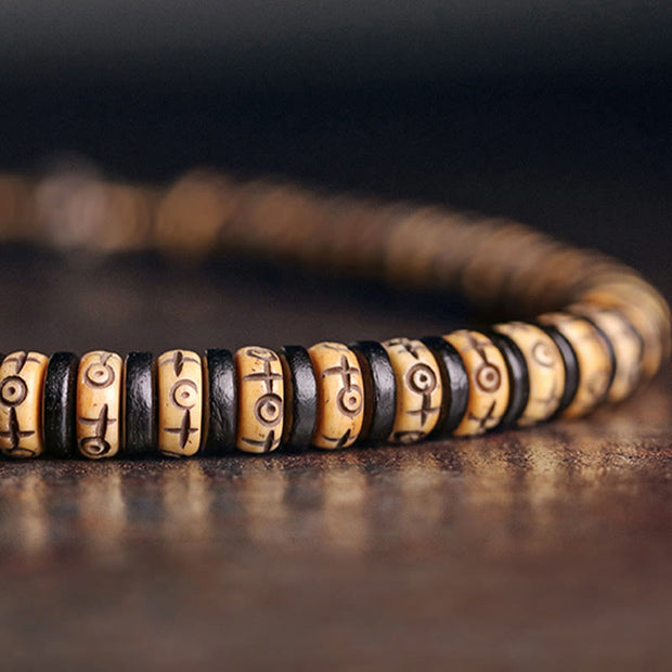 Buddha Stones Yak Bone Ebony Wood Brass Strength Bracelet