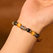 FREE Today: Protection Strength Blue Green Red Tiger Eye Buddha Head Bracelet FREE FREE 23