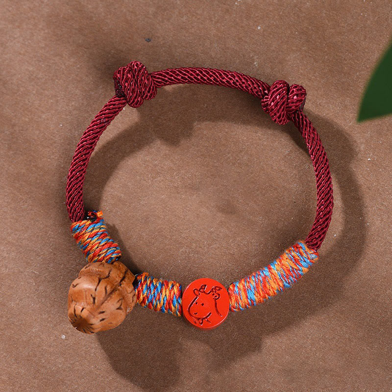 Buddha Stones Handmade Chinese Zodiac Red String Peach Pit