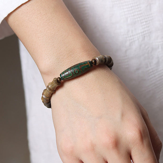 FREE Today: Peace and Soothing Tibetan Nine-Eye Dzi Bead Green Sandalwood Bracelet