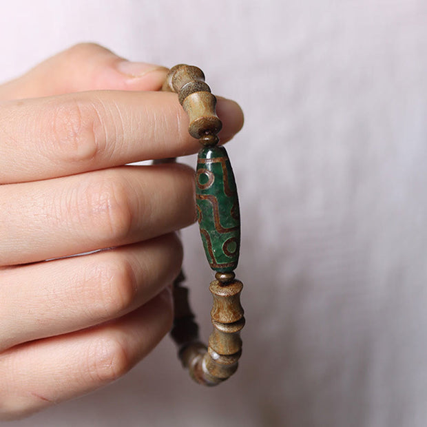 FREE Today: Peace and Soothing Tibetan Nine-Eye Dzi Bead Green Sandalwood Bracelet