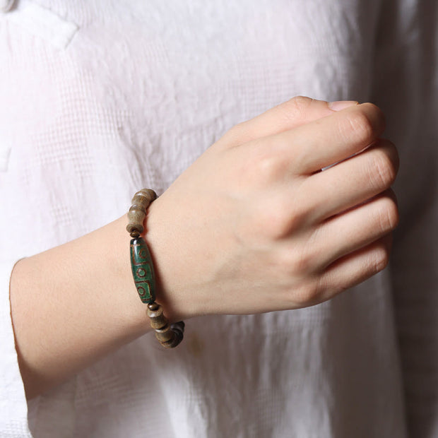 FREE Today: Peace and Soothing Tibetan Nine-Eye Dzi Bead Green Sandalwood Bracelet