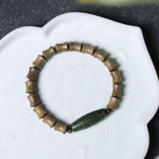 FREE Today: Peace and Soothing Tibetan Nine-Eye Dzi Bead Green Sandalwood Bracelet