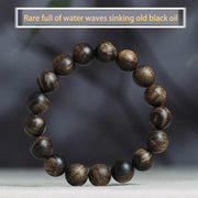 Buddha Stones Rare Brunei Agarwood Water Ripple Pattern Peace Calm Bracelet