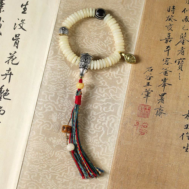 FREE Today: Peace and Harmony Natural White Bodhi Seed Stone Tassel Wrist Mala Bracelet