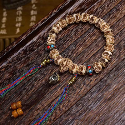 Buddha Stones Tibetan Camel Bone Garuda Carved Protection Tassel Bracelet