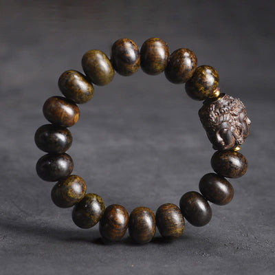Buddha Stones Tibetan Three-Faced Buddha Serenity Wood Bracelet - Wood(Wrist Circumference 14-17cm) - image 1