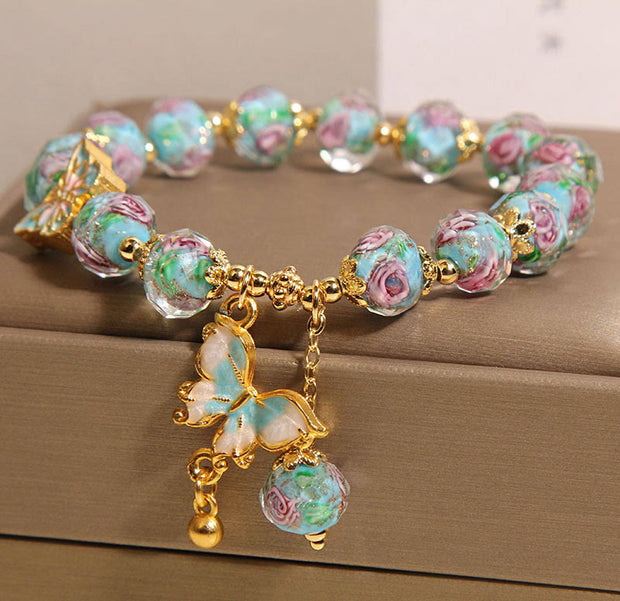 Gratuit aujourd'hui: Love Freedom Butterfly Charm Rose Flower Liuli Bracelet