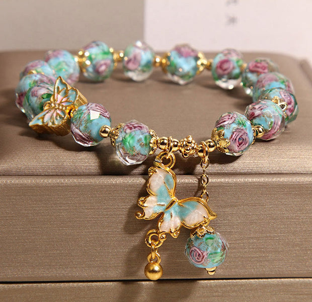 Gratuit aujourd'hui: Love Freedom Butterfly Charm Rose Flower Liuli Bracelet