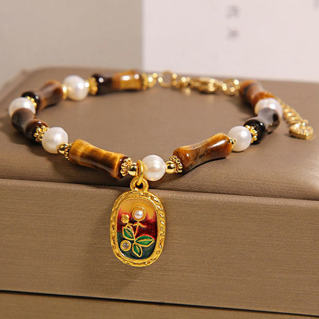 FREE Today: Protection and Strength Natural Bamboo Tiger Eye Pearl Bracelet - image 1