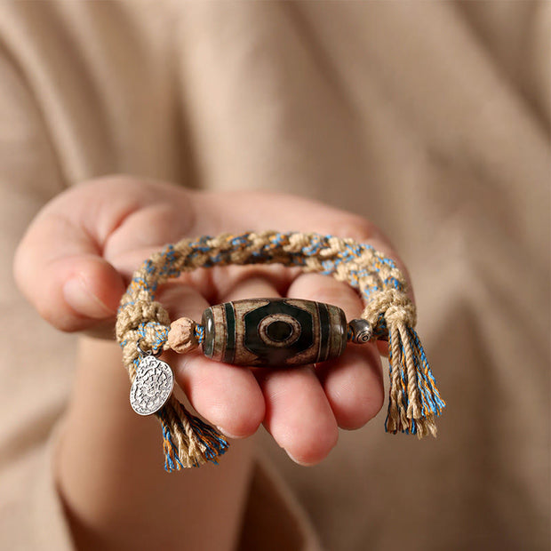 FREE Today: Wealth and Protection Handmade Tibetan Dzi Bead Braided String Bracelet - image 5