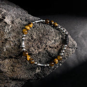 Buddha Stones Cute Bone Pattern Tiger Eye Courage Beads Bracelet - Tiger Eye & Titanium Steel(Wrist Circumference: 15-21cm) - image 1