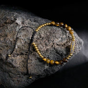 Buddha Stones Cute Bone Pattern Tiger Eye Courage Beads Bracelet - Yellow Tiger Eye & Titanium Steel(Wrist Circumference: 15-21cm) - image 1