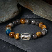 Buddha Stones Silver Sheen Obsidian Tiger Eye Om Mani Padme Hum Three-Faced Buddha Positive Bracelet - image 1