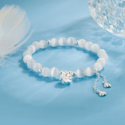 Buddha Stones Natural Cat's Eye Cherry Blossom Peace Bracelet - White Cat's Eye(Wrist Circumference:15-17cm) - image 0