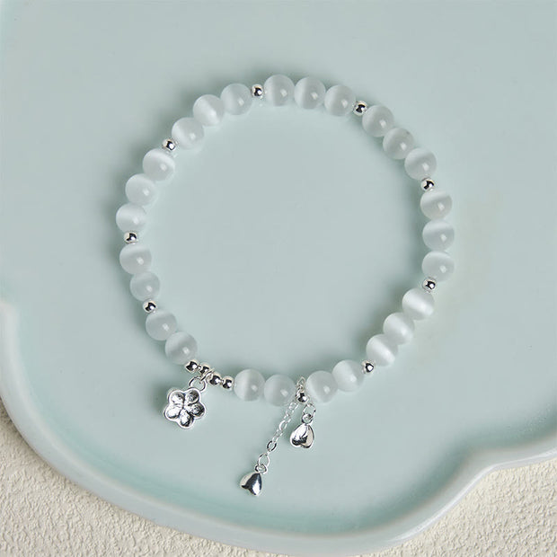 FREE Today: Peace and Love Natural Cat's Eye Cherry Blossom Bracelet - image 3
