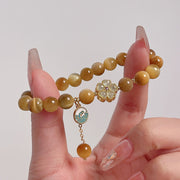 Buddha Stones Natural Golden Tiger Eye Bell Flower Courage Bracelet - image 9