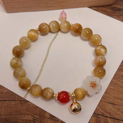Buddha Stones Natural Golden Tiger Eye Bell Flower Courage Bracelet - Tiger Eye & White Flower (Wrist Circumference: 14-16cm) - image 0