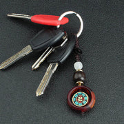 Buddha Stones Ebony Wood Sanskrit Four-leaf Clover Buddha's Eye Peace Rotatable Key Chain - image 3
