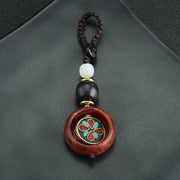 Buddha Stones Ebony Wood Sanskrit Four-leaf Clover Buddha's Eye Peace Rotatable Key Chain - image 9