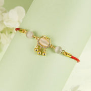 Buddha Stones Chinese Lock Charm Cat's Eye Red String Copper Plated Gold Protection Bracelet - image 1