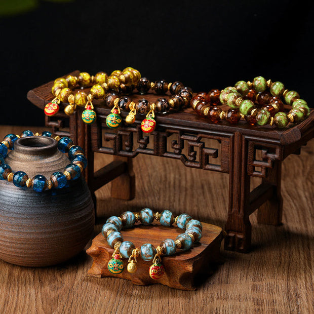 Buddha Stones Gold Swallowing Beast Family Charm Liuli Glass Bead Fortune Bracelet - image 1