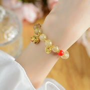 Buddha Stones Natural Golden Rutilated Quartz Fu Character Charm Bell Wealth Bracelet