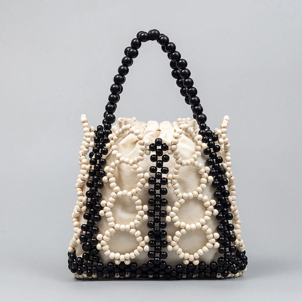 Buddha Stones Hand-woven Round Hollow Wooden Beads Handbag