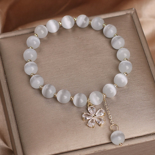 FREE Today: Peace and Love Flower Charm Cat's Eye Bracelet