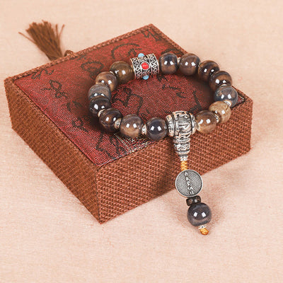 Buddha Stones Tibet Om Mani Padme Hum Prayer Wheel Dorje Vajra Engraved Glass Bead Wisdom Bracelet (Extra 35% Off | USE CODE: FS35) - Turquoise Om Mani Padme Hum - image 0