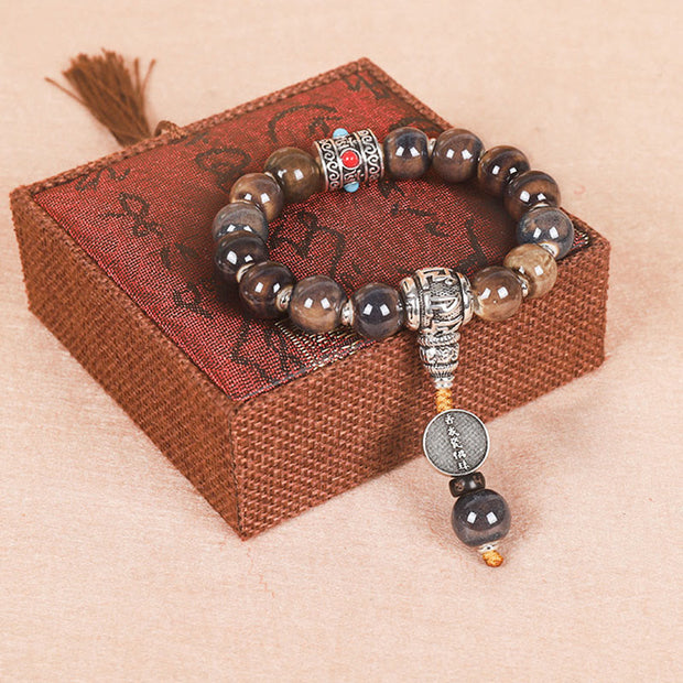 Buddha Stones Tibet Om Mani Padme Hum Prayer Wheel Dorje Vajra Engraved Glass Bead Wisdom Bracelet (Extra 35% Off | USE CODE: FS35) - Turquoise Om Mani Padme Hum - image 0