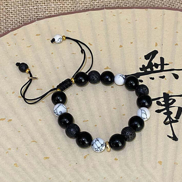 Buddha Stones Black Obsidian Lava Rock Stone Yin Yang Strength Bracelet