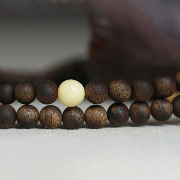 Buddha Stones 999 Gold Tarakan 108 Mala Beads Agarwood Amber Ward Off Evil Spirits Bracelet Mala Bracelet BS 17
