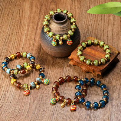 Buddha Stones Gold Swallowing Beast Family Charm Liuli Glass Bead Fortune Bracelet - image 0