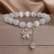 FREE Today: Peace and Love Flower Charm Cat's Eye Bracelet