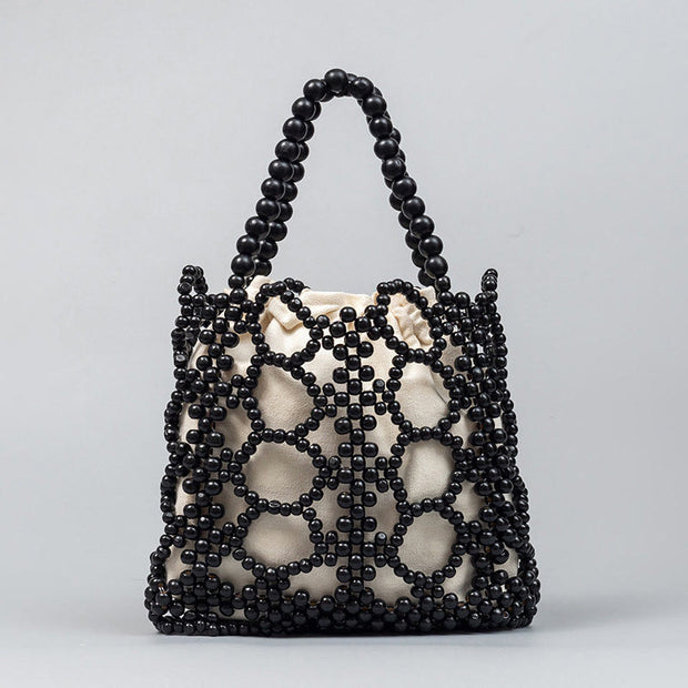 Buddha Stones Hand-woven Round Hollow Wooden Beads Handbag