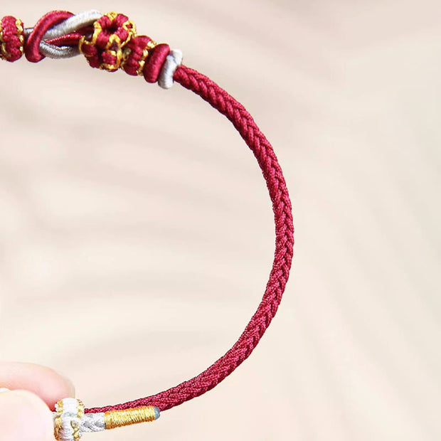 Buddha Stones Handmade Peach Blossom Knot Eight Thread Peace Knot Luck Protection Bracelet
