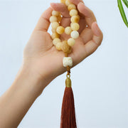 Buddha Stones Natural Bodhi Seed Ivory Fruit Dancing Lion Charm Harmony Tassel Wrist Mala
