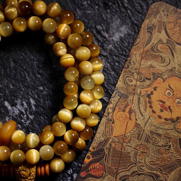 Buddha Stones 108 Mala Beads Natural Tiger Eye Copper Dorje Protection Tassel Bracelet Mala Bracelet BS 1