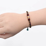 Buddha Stones Tibetan Handmade Eight Thread Knot Copper Coin Luck Weave String Bracelet Bracelet BS 4
