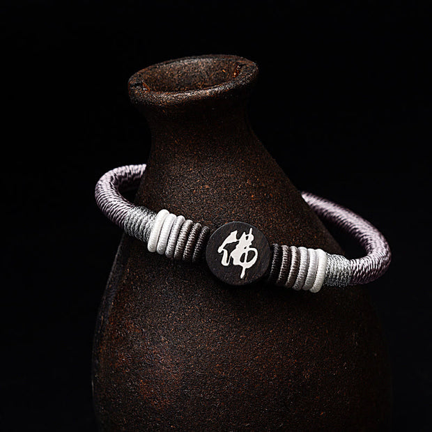 Buddha Stones Buddha Character Ebony Handcrafted Rope Bracelet