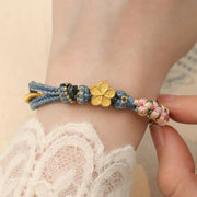 Buddha Stones Peach Blossom Design Wealth String Bracelet
