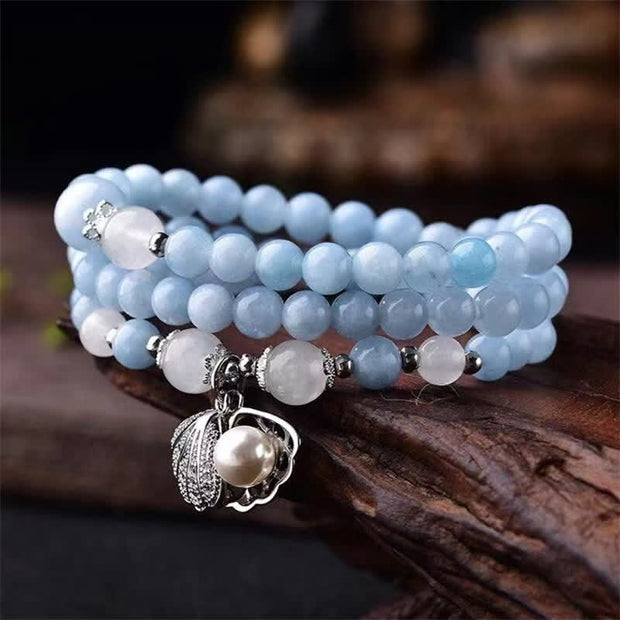 Buddha Stones Aquamarine Peace Shell Charm Bracelet