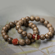 Buddha Stones Tarakan Agarwood Amber Red Agate Laughing Buddha Strength Meditation Bracelet